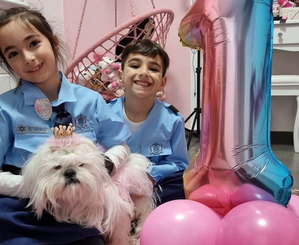 Kids celebrating dog birthday